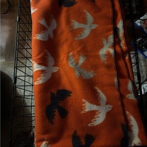 Orange Blanket with Bird Pattern